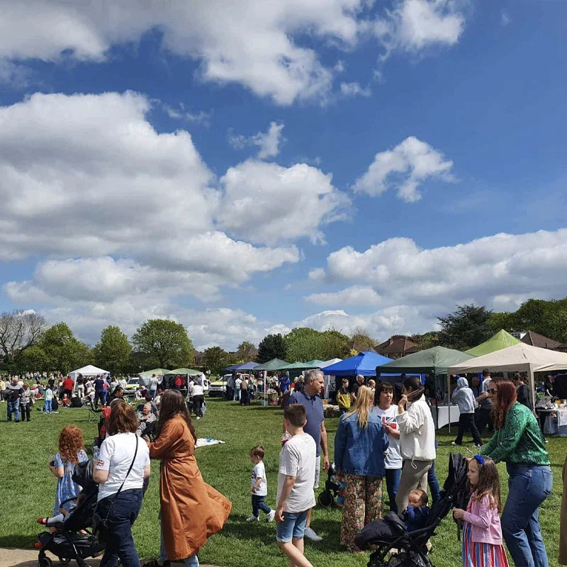 Outdoor stalls at party in the park